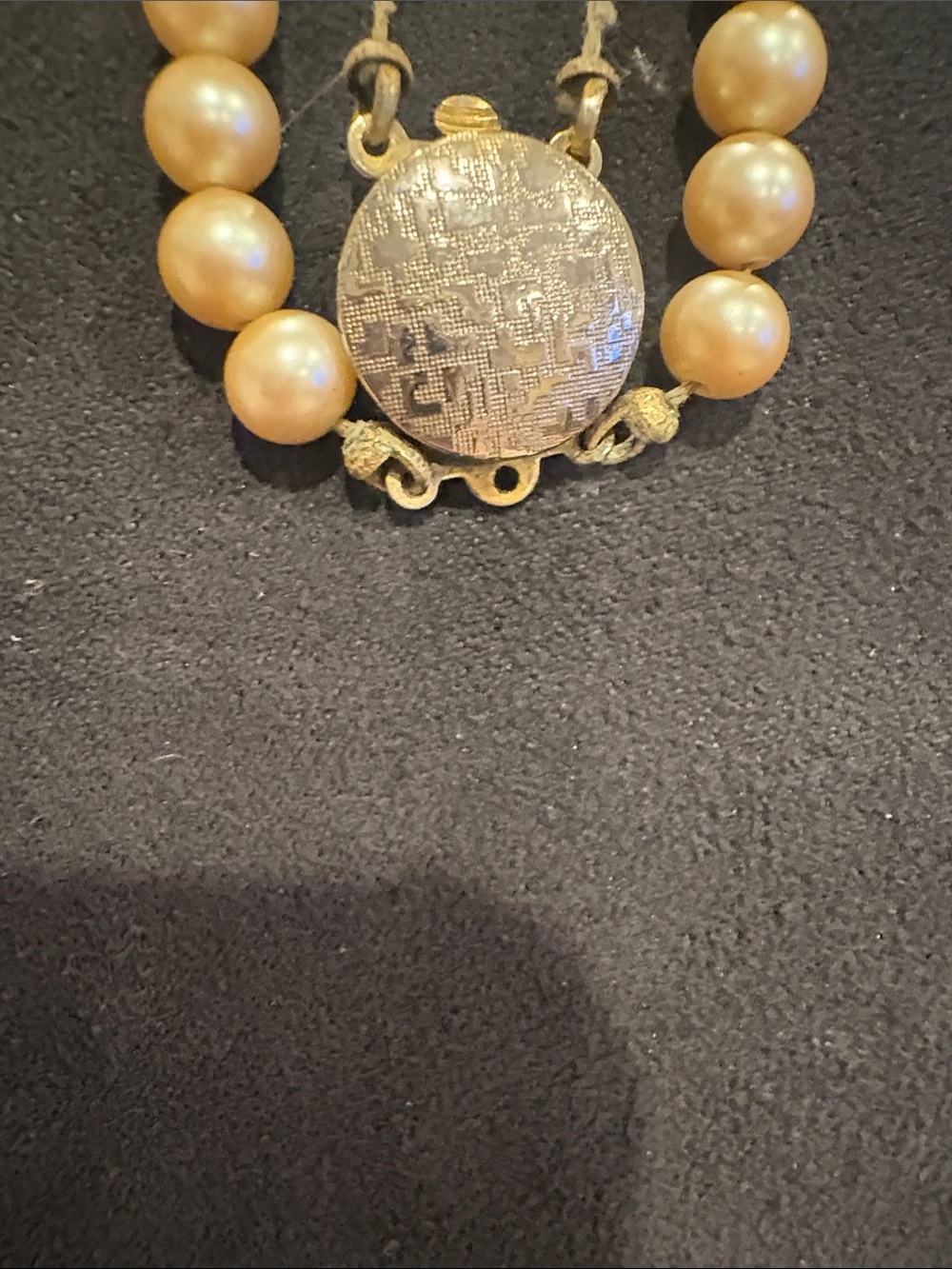 Gold-Tone Pearl Strand Necklace with Decorative Round Clasp